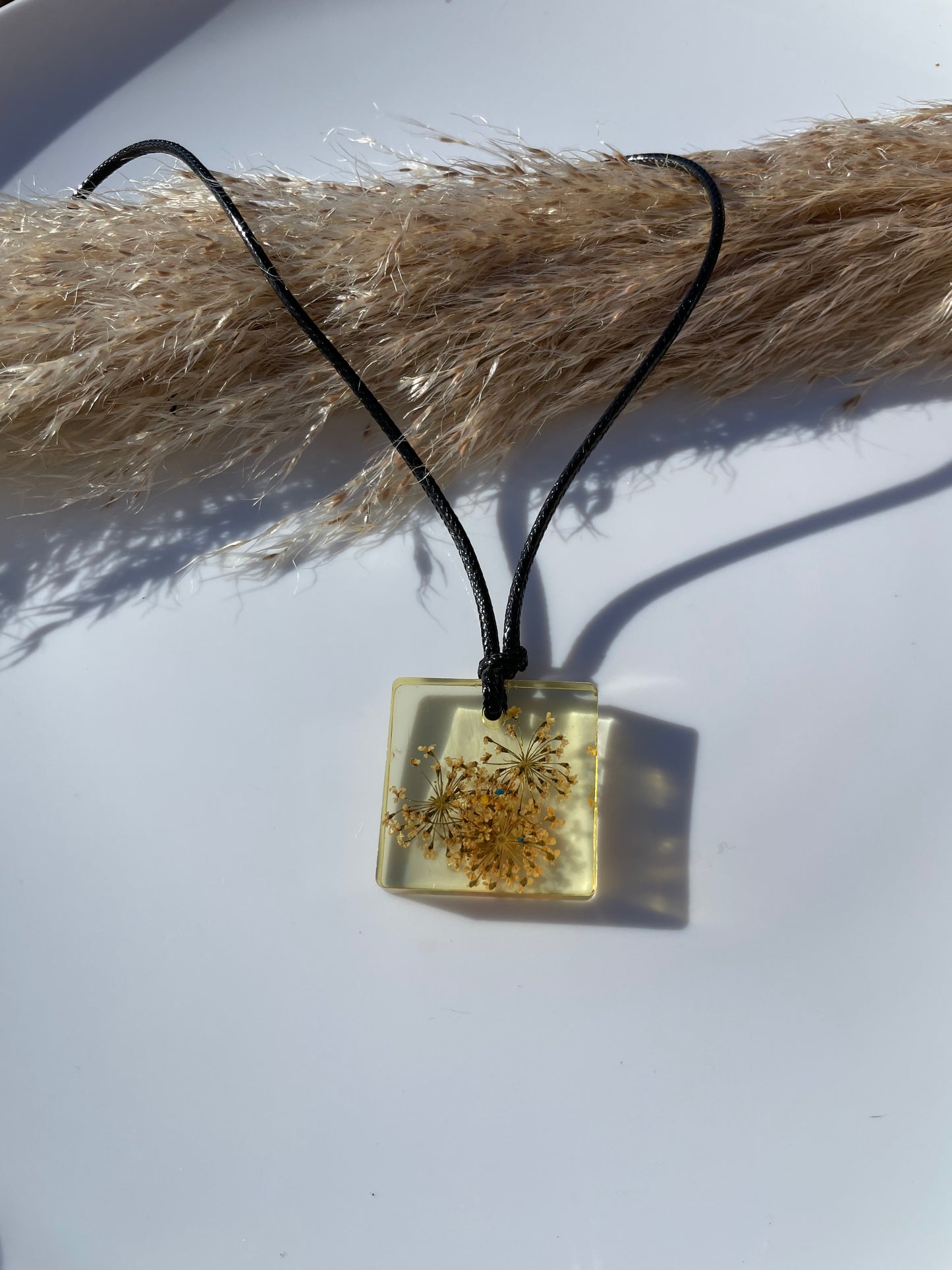 "Golden Wildflower Resin Necklace"