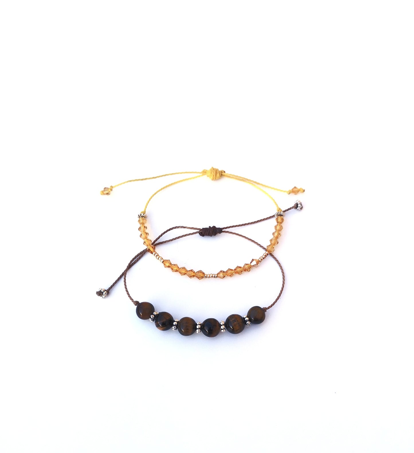 Brown and yellow crystal bead adjustable bracelet set.