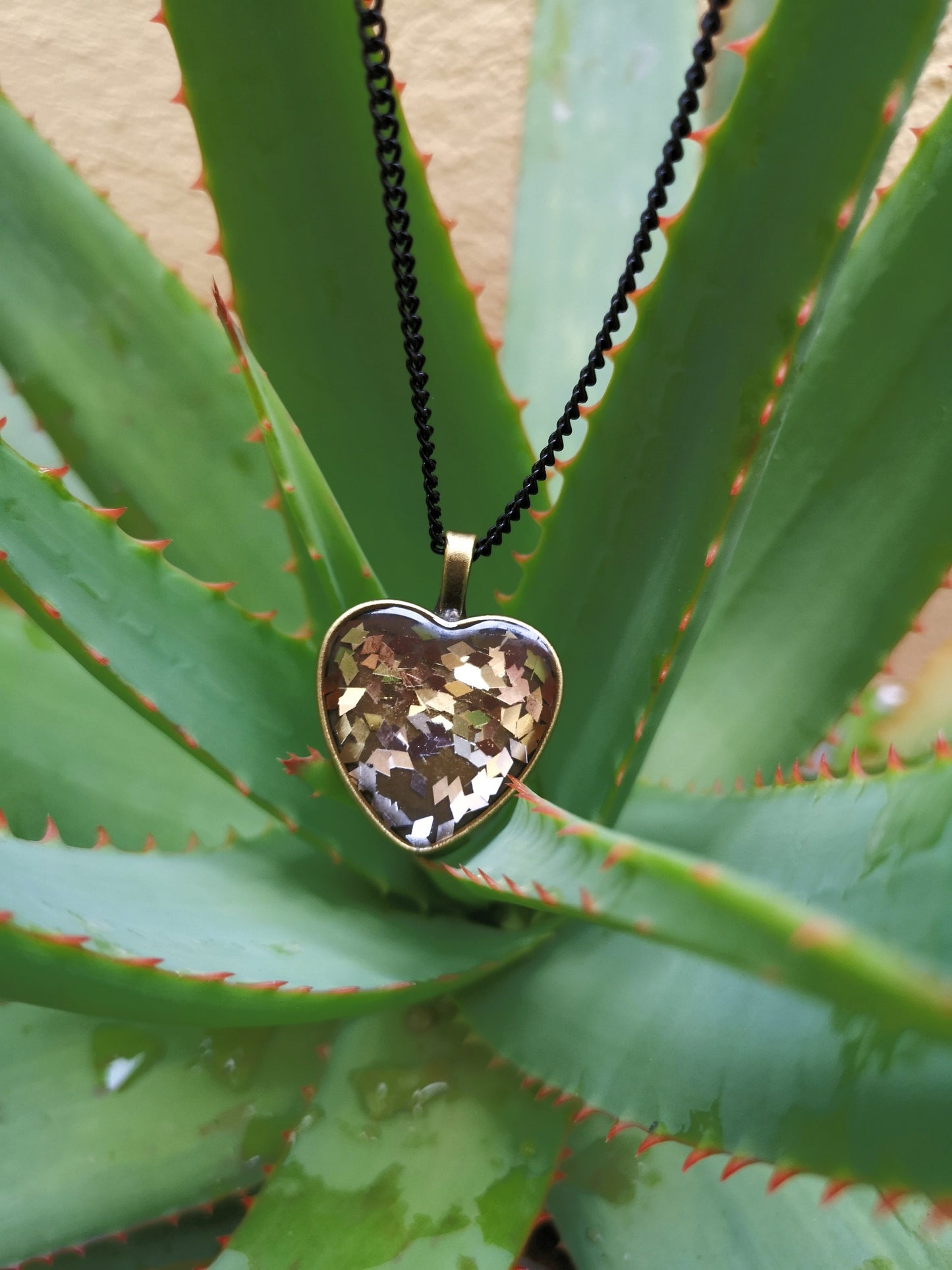 Heart and sequin pendant chain